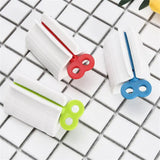 Toothpaste Squeezer,  Toothpaste Holder,  Oral Care Bathroom Tools,  Rolling Squeezing Dispenser for Bathroom.
